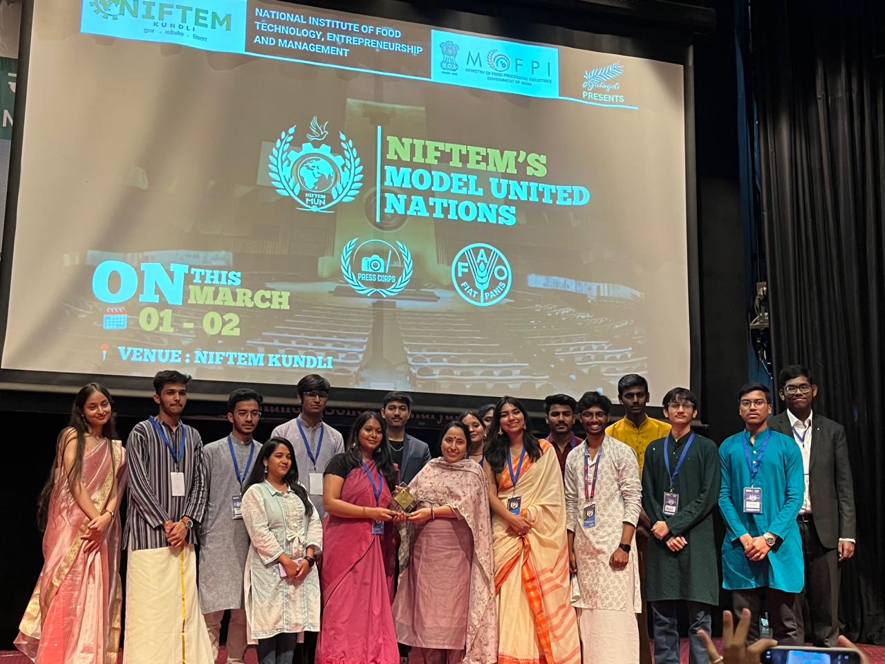 Group photo of Geetanjali society members at an event